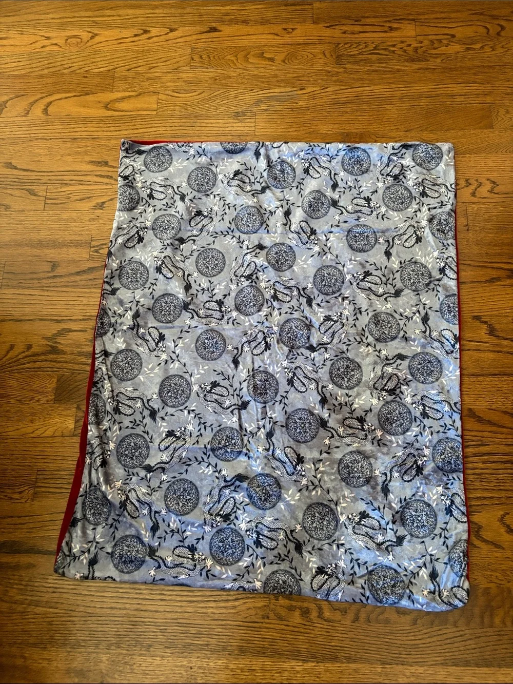 Red Velvet Reversible Blanket with dragon pattern matching beanie